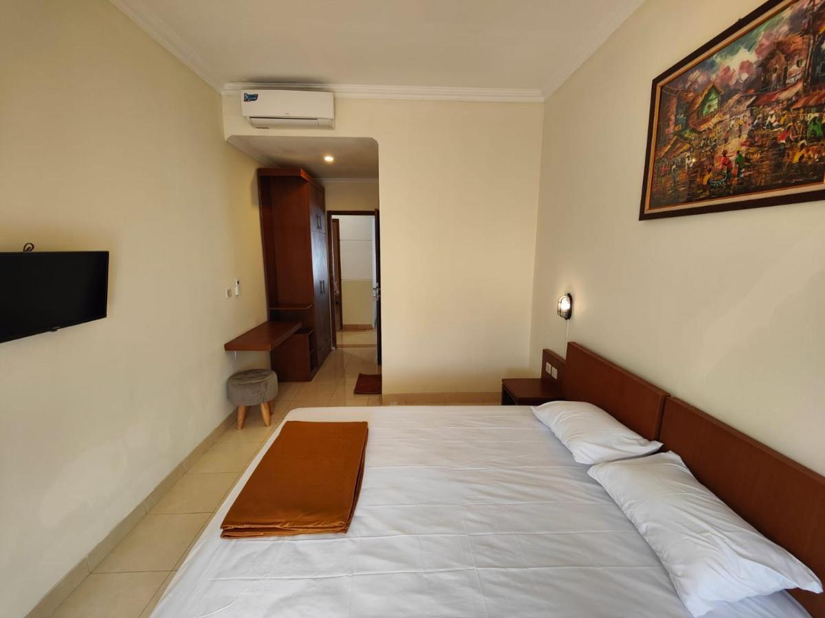 Adiputra Guesthouse 2 By Homiq Ngabean Buitenkant foto