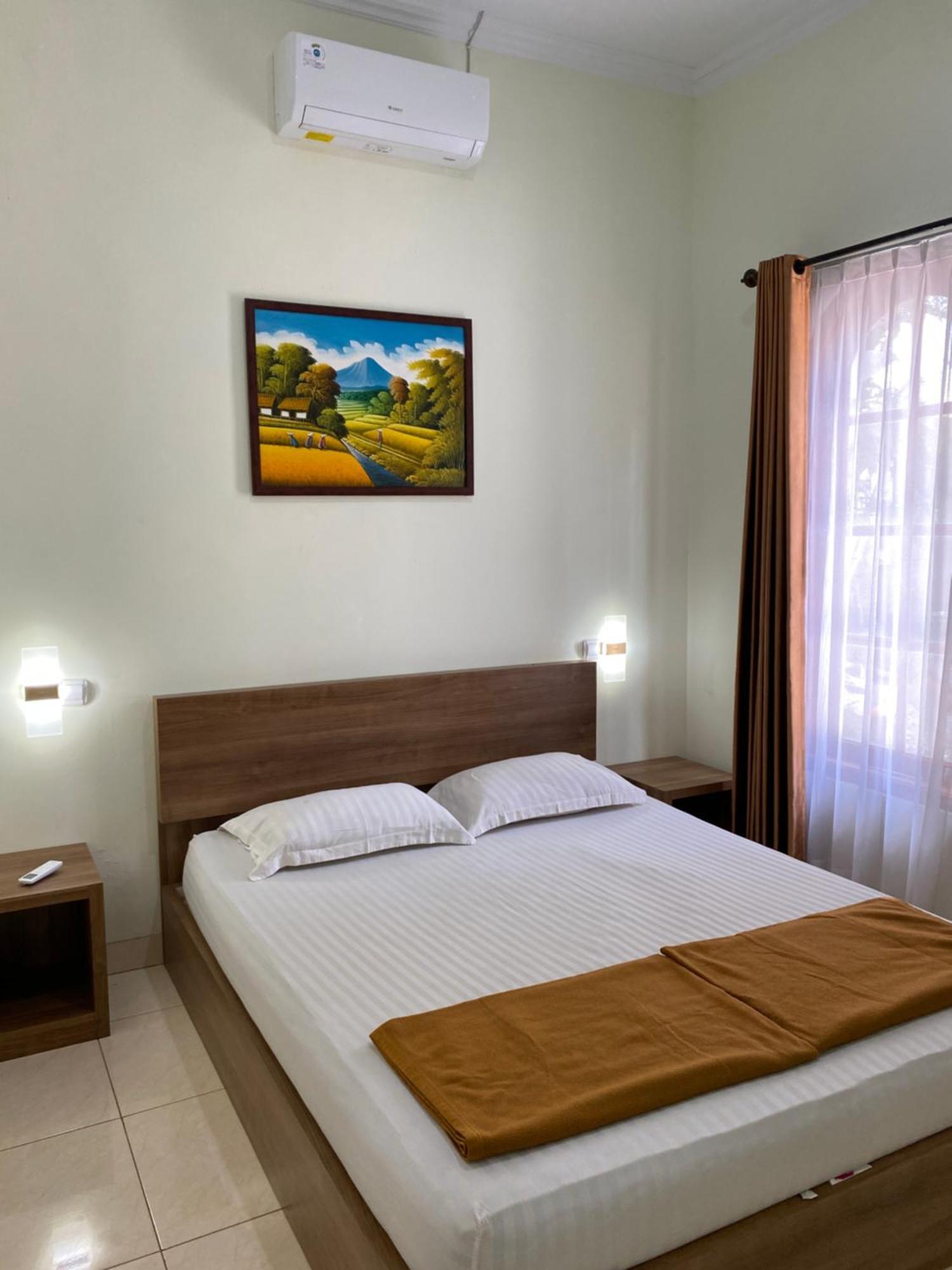 Adiputra Guesthouse 2 By Homiq Ngabean Buitenkant foto