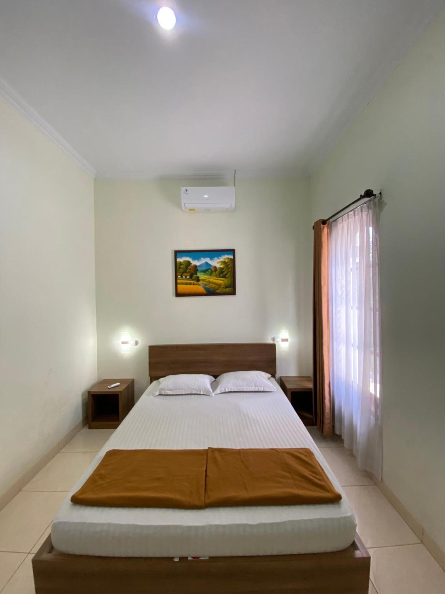 Adiputra Guesthouse 2 By Homiq Ngabean Buitenkant foto